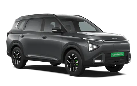 Carens Clavis EV in Gravity Grey, front three-quarter view