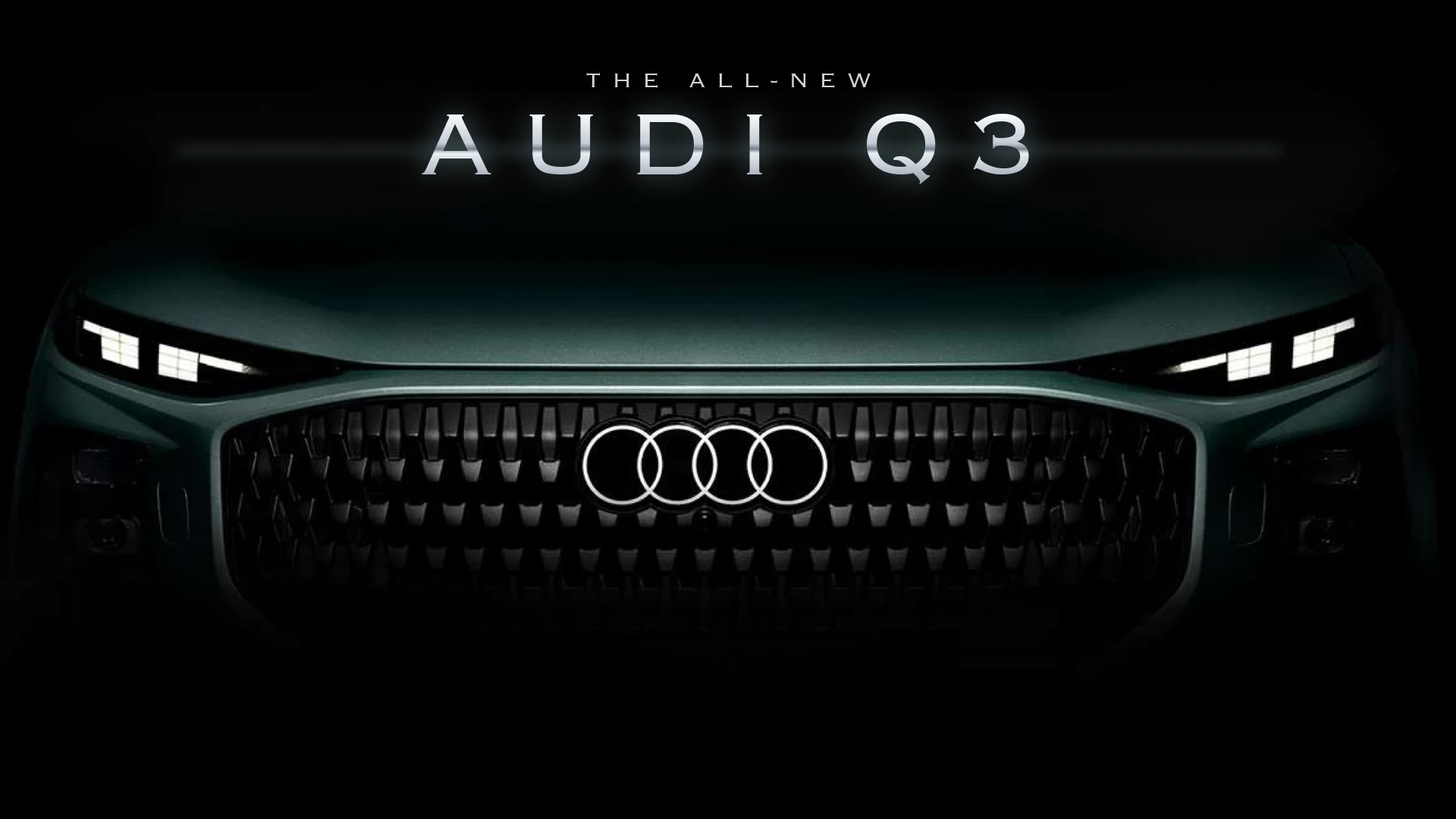 Front of the all-new Audi Q3 in the dark with its illuminated Audi rings and LED light signatures