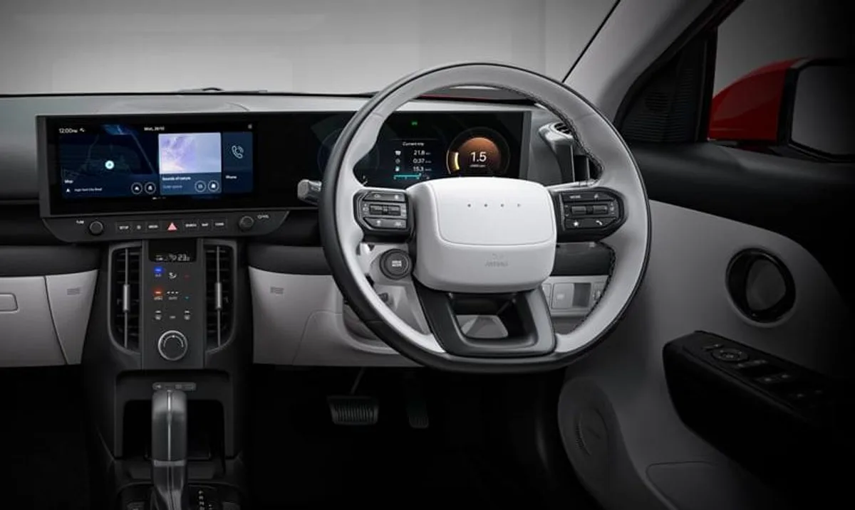 Hyundai Bayon dashboard with twin 12.3-inch curved screens and a two-spoke steering wheel