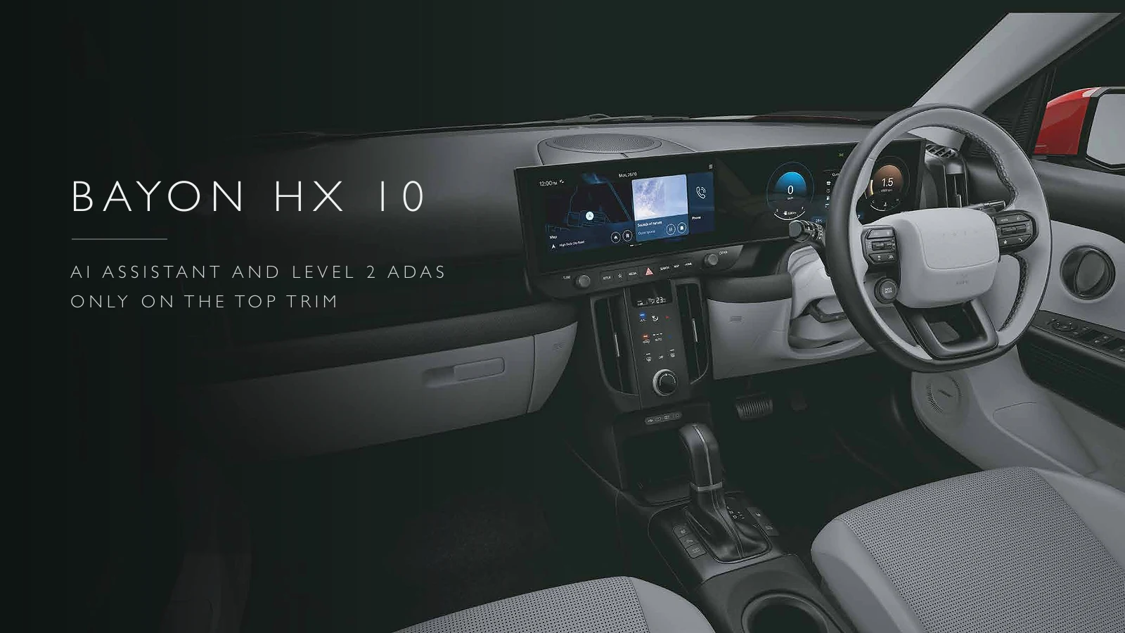 Hyundai Bayon HX 10 dashboard with dual curved screens, a two-spoke steering wheel and the iVT gear selector