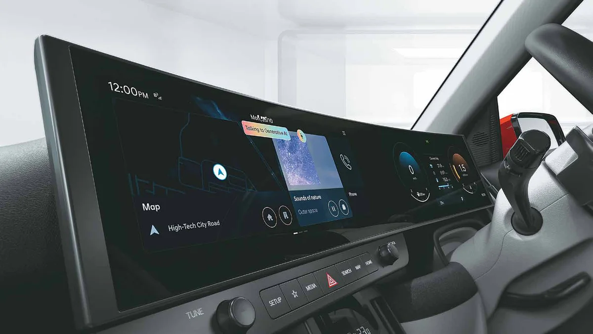 Dual curved 12.3-inch displays in the Hyundai Bayon HX 10, showing a map and media tiles