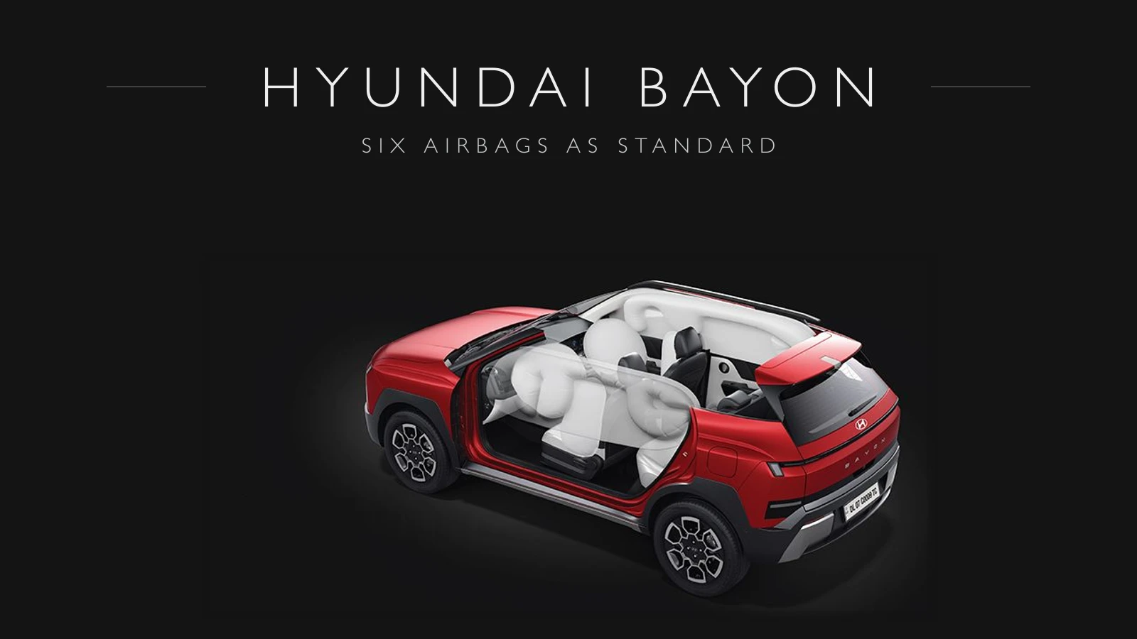 Hyundai Bayon cutaway showing its six airbags deployed, on a dark background