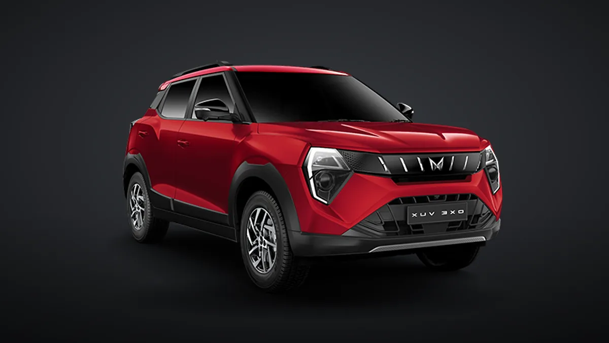 Mahindra XUV 3XO compact SUV in Tango Red seen from the front three-quarter angle